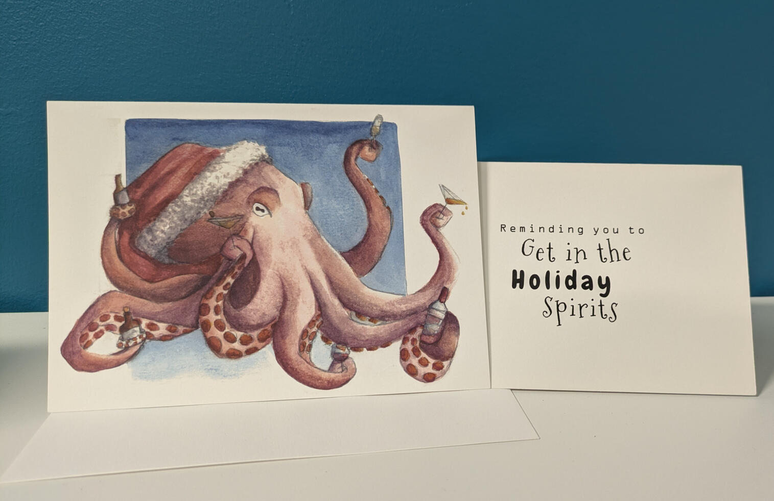 A hand-painted watercolour painting of an octopus in a vivid tie-dye pop art-inspired style. The octopus has bold line work and sharp angles, while also having a soft, bright blending of reds, blues, yellow, and purple. It sits against a similar background